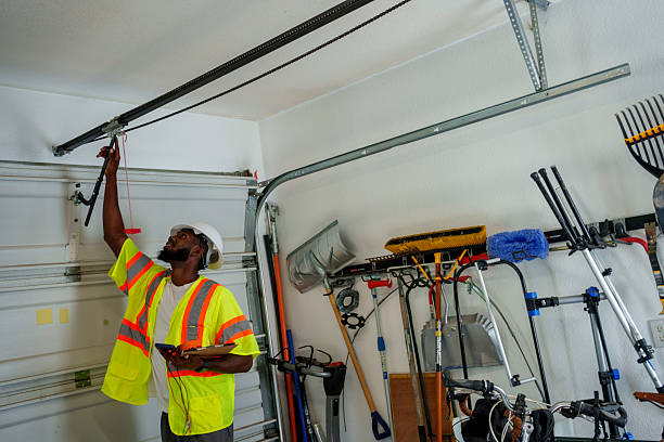 Professional Garage Door Maintenance technician working in Ecru, MS